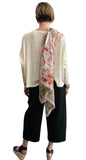 Asymmetric cream knit sweater long sleeves round neck cut