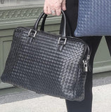 Black Briefcase Modena Intrecciato leather, two top handles & detachable leather strap. Classic design for a versatile briefcase
