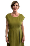 Avocado dress, pleated front, sleeveless, round neck. Elegant and timeless.