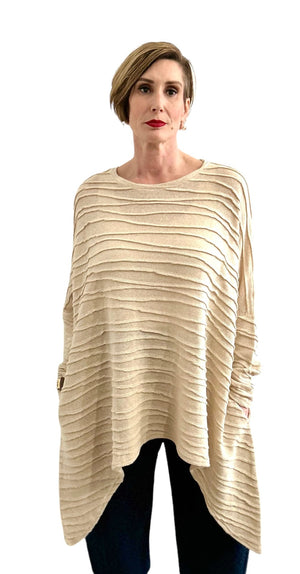 Introducing our Cream Asymmetrical Long Sweater For Women